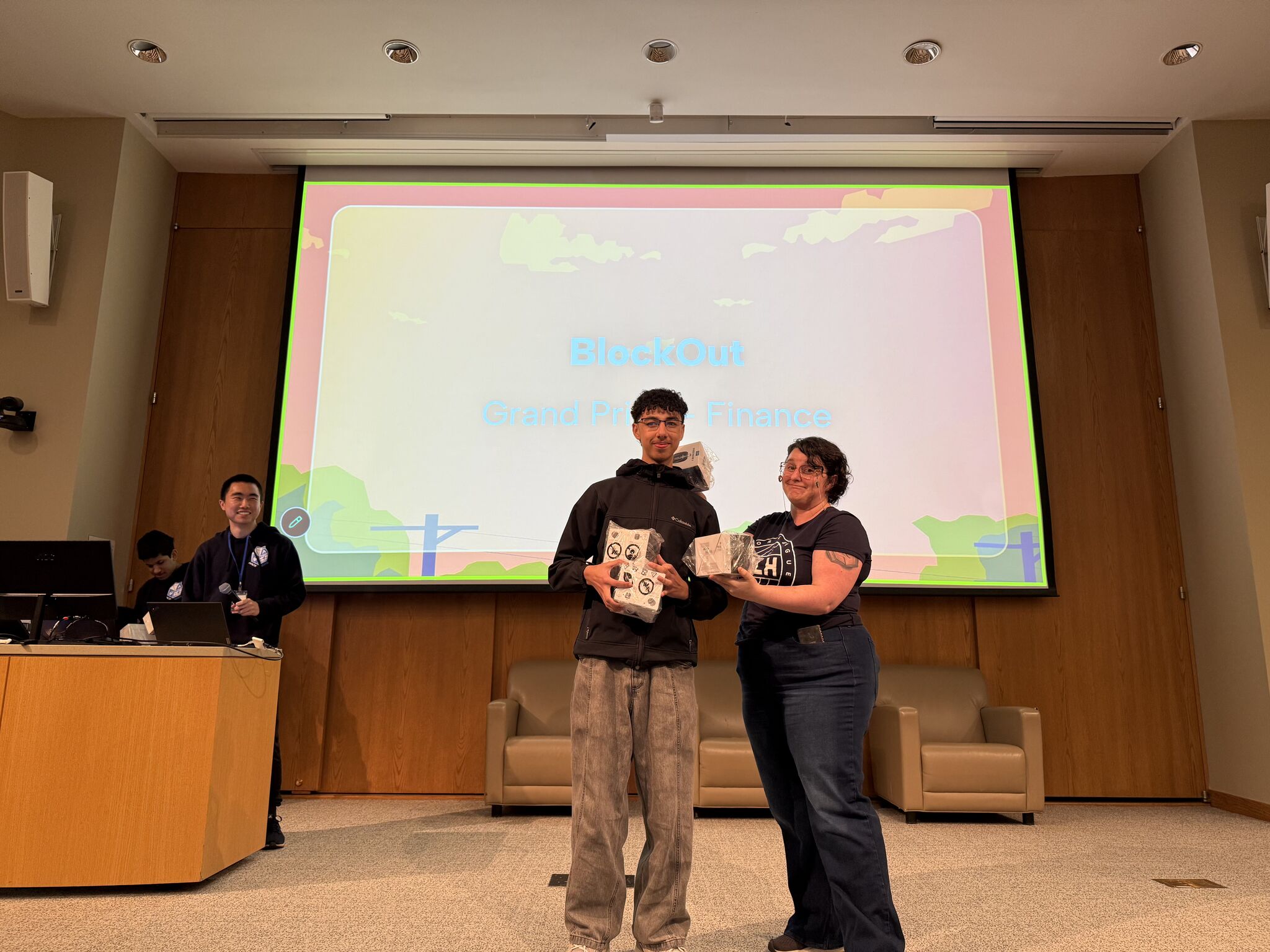 Sami on stage at HackDuke as BlockOut takes the Finance track grand prize